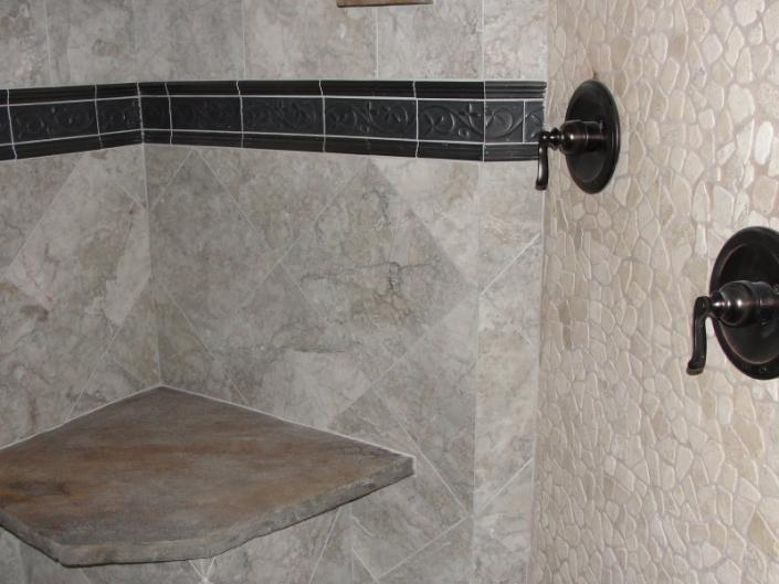 Have the shower of your dreams! AC/DC Electrical Contracting Company Inc. can make them in to reality or we can completely design one for you. This shower has a customized tile.